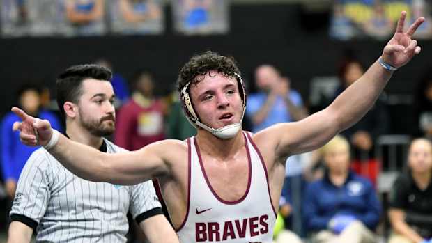 Lake Gibson senior Gianni Maldonado reacts after winning Class 2A 157-pound wrestling state championship on Saturday at Silver Spurs Arena in Kissimmee. It was the second straight state title of his career. 